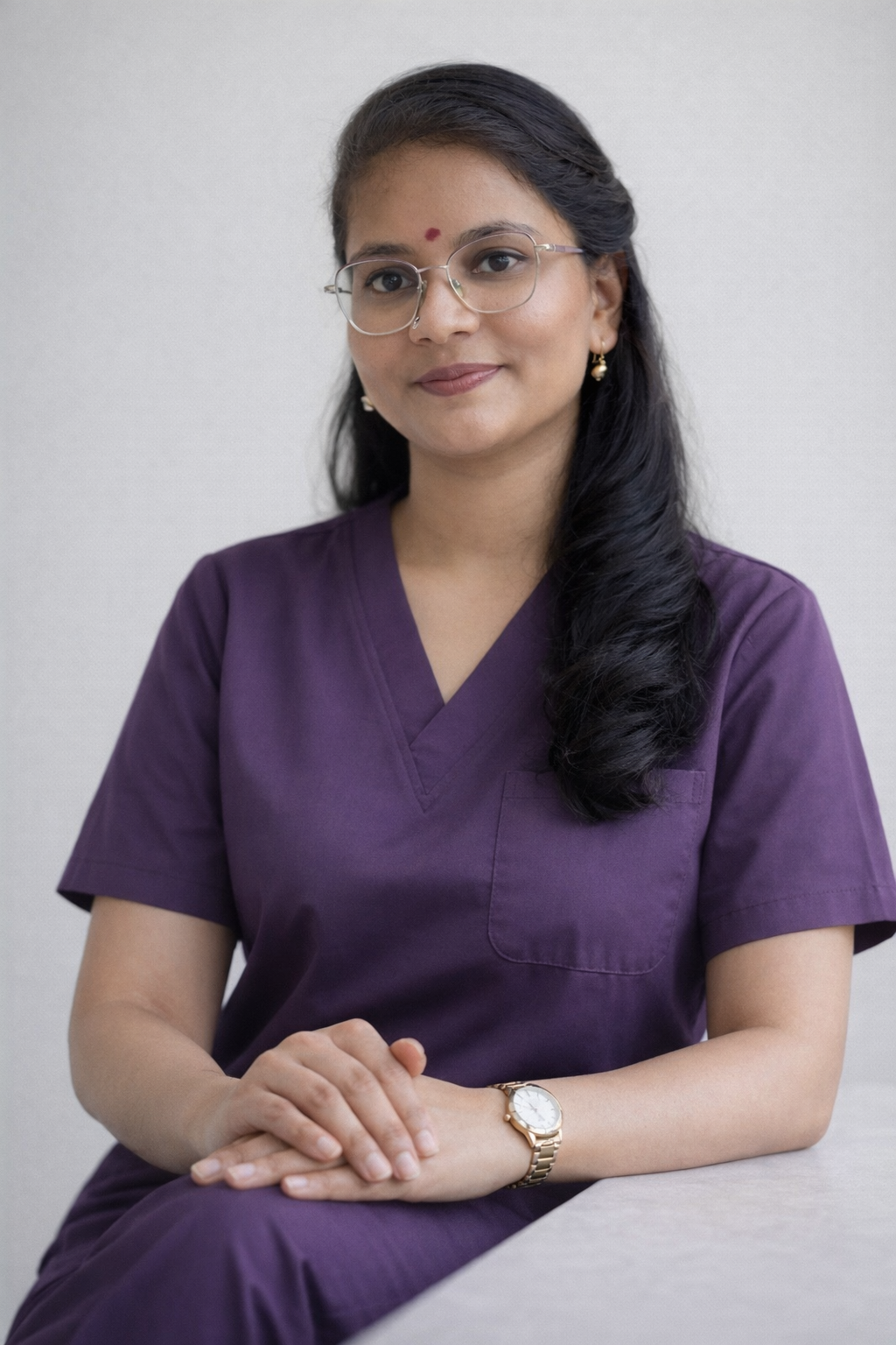 Maheshwari Gupta in dental scrubs